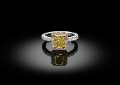 Modern ring, in a combination of yellow, pink and white diamonds and gold.